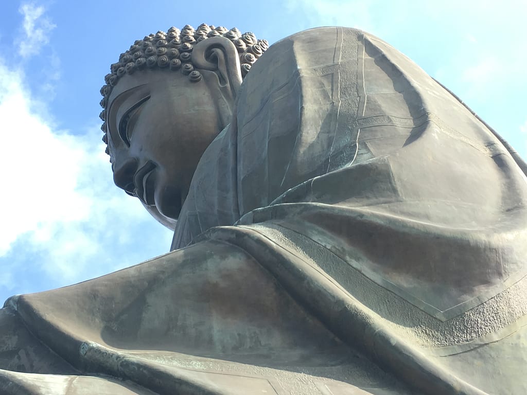 Buddah against blue sky